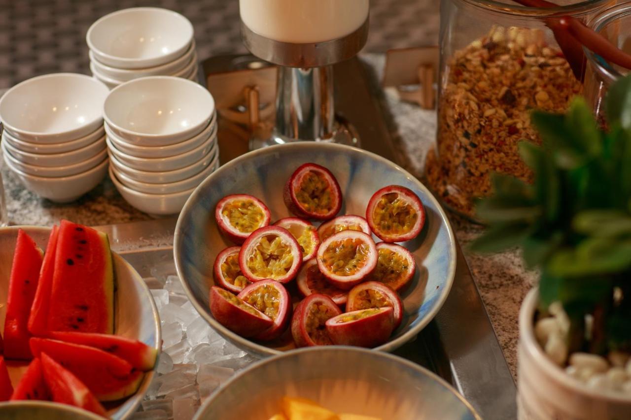 Grand Sunrise Palace Hoi An- A Luxury Indochine Hotel & Spa Esterno foto Passion fruit