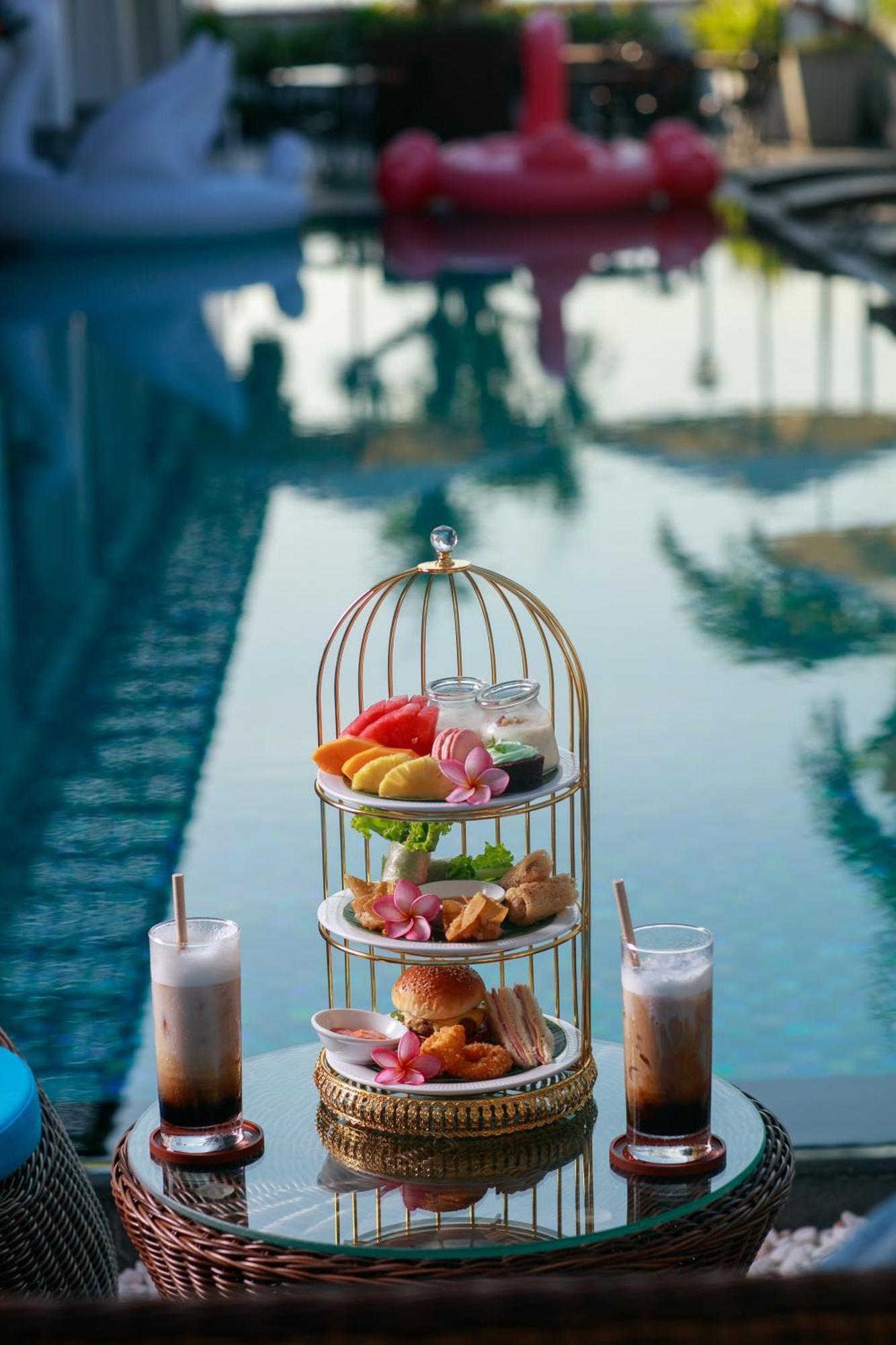 Grand Sunrise Palace Hoi An- A Luxury Indochine Hotel & Spa Esterno foto Afternoon tea at the Royal Mirage